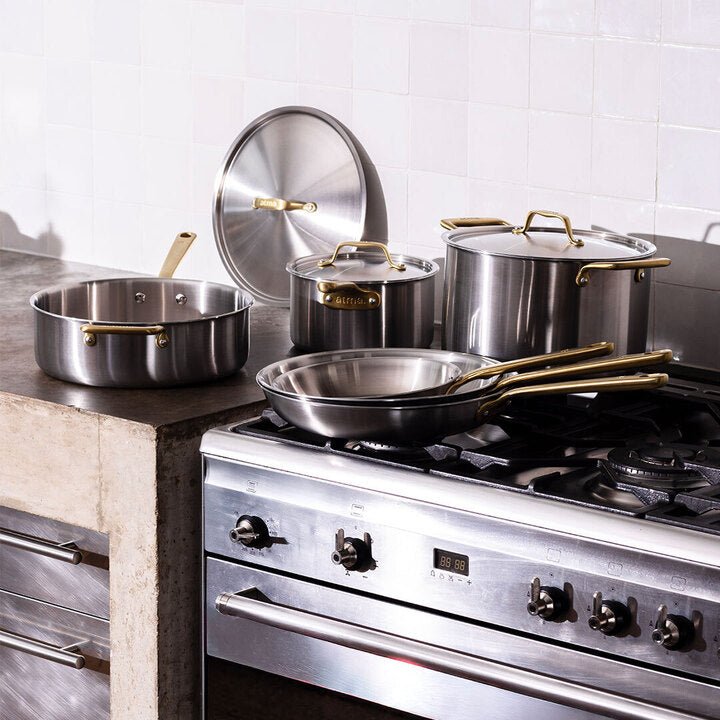 Batterie de cuisine en inox avec manches dorés, 15 pièces
